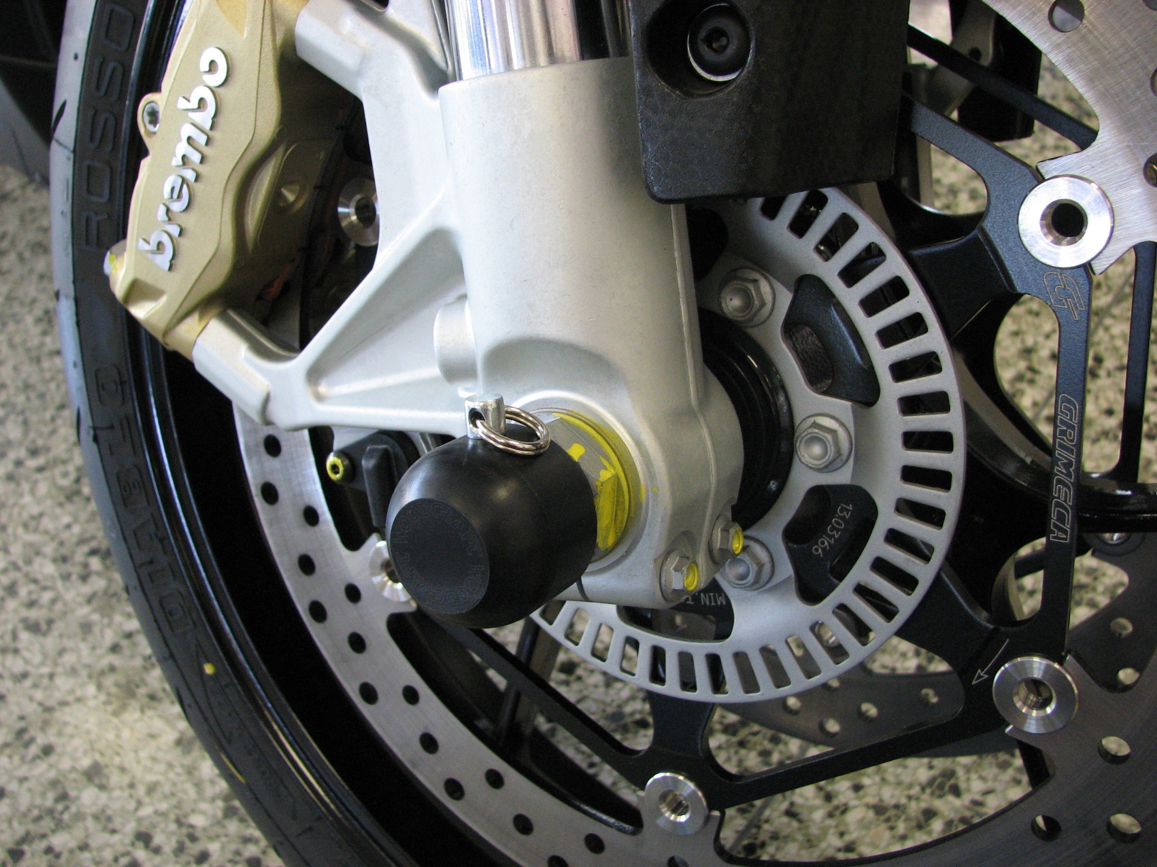 Woodcraft Front Axle Sliders - Aprilia (Multiple Models)